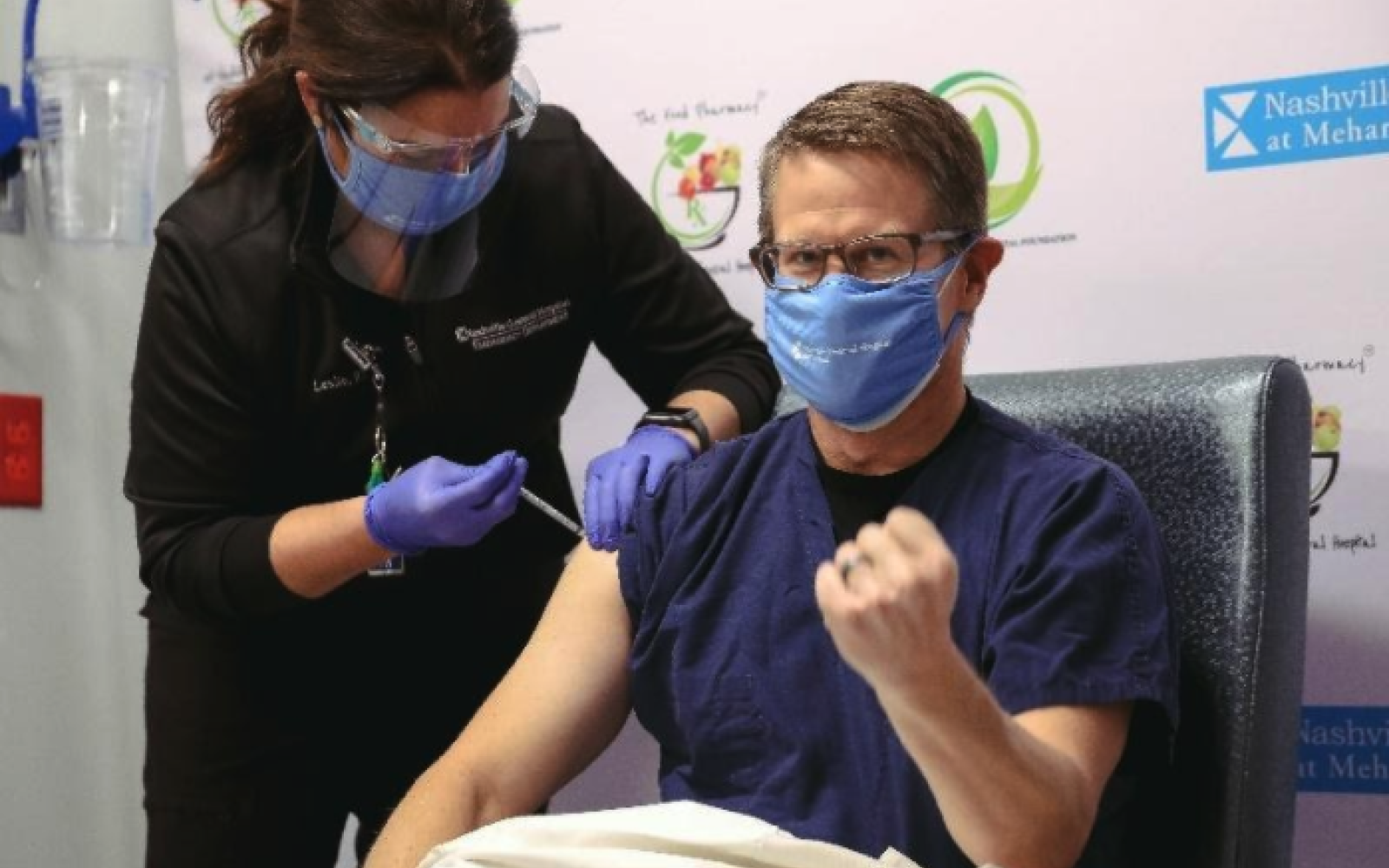 Man receives Covid vaccine