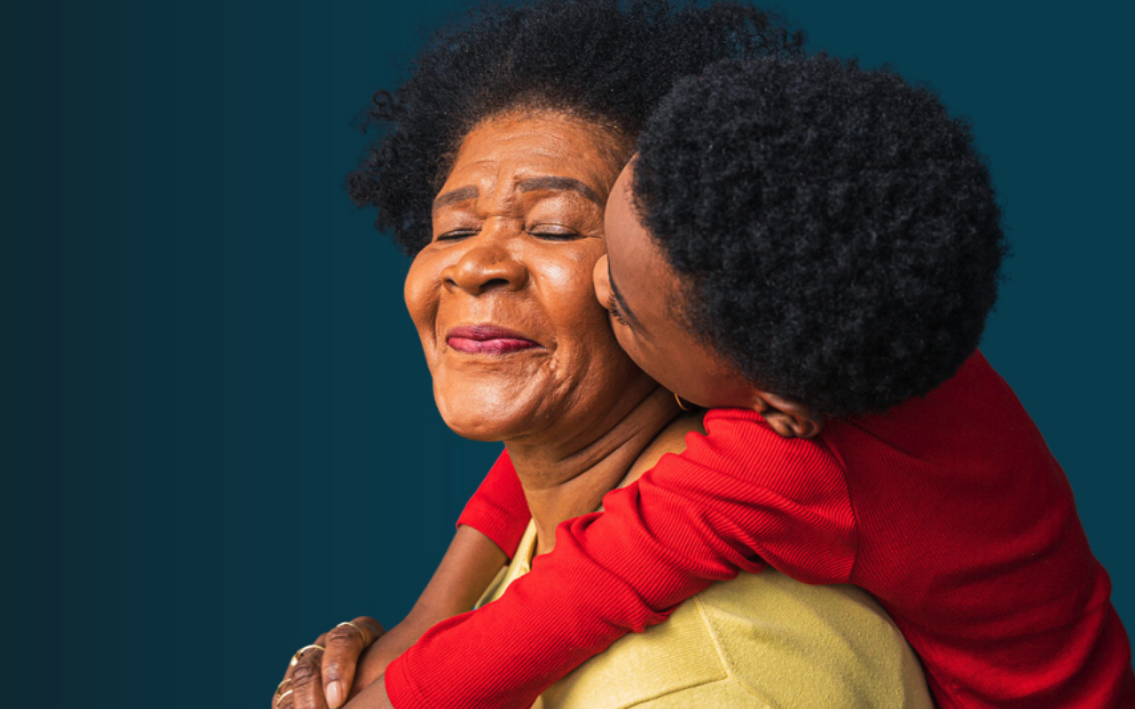 grandchild hugs grandmother