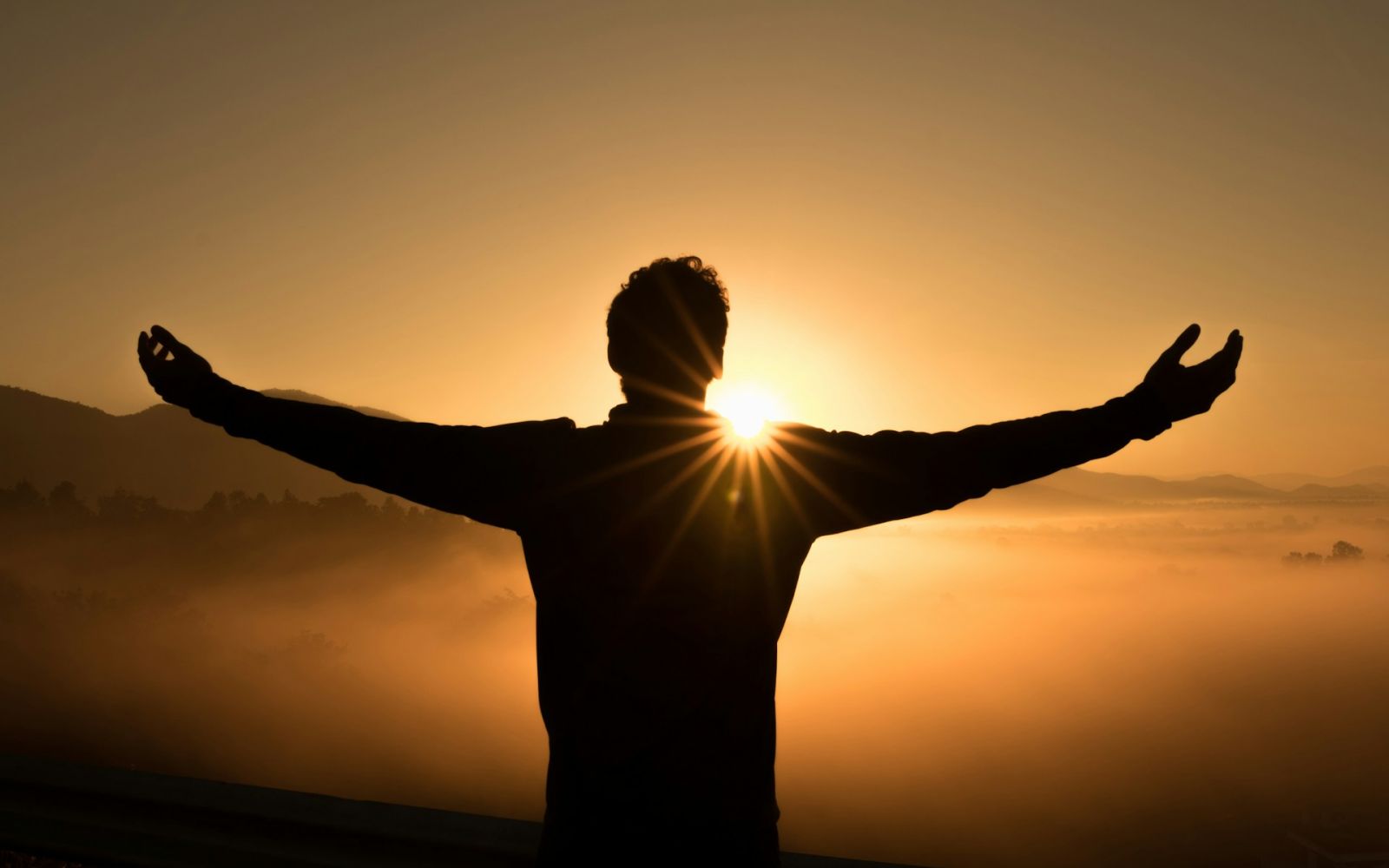 Man experiencing sunrise