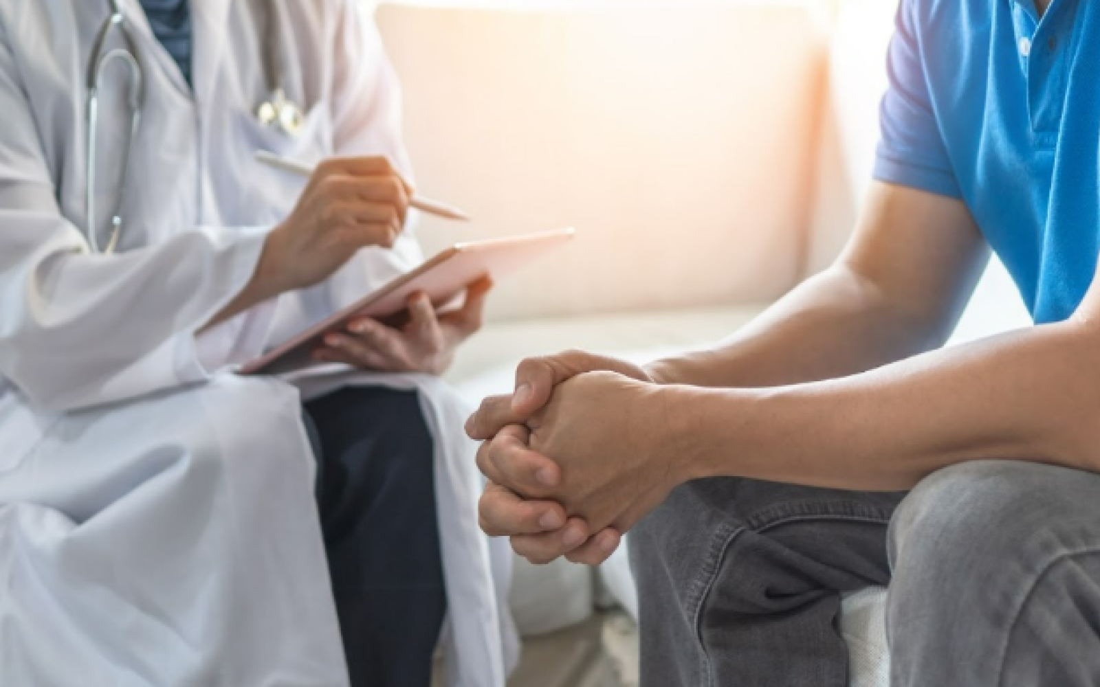 doctor talking to patient