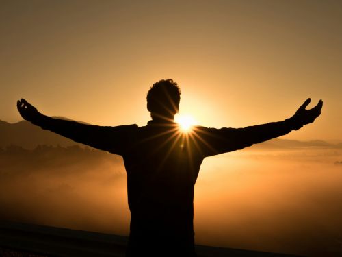 Man experiencing sunrise