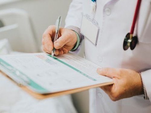 doctor taking notes
