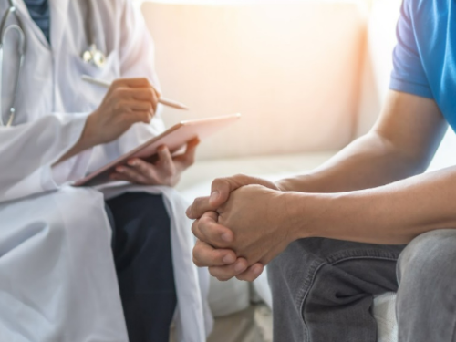 doctor talking to patient