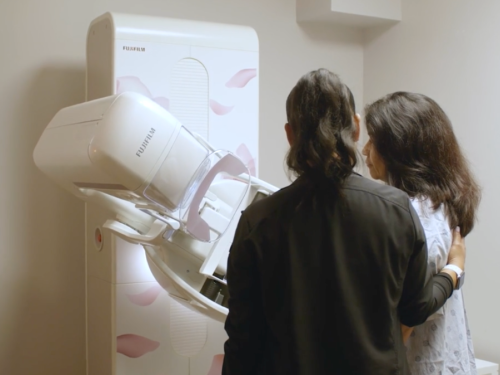 Dami Tila-Veliz receives a mammogram using Fujifilm's ASPIRE Cristalle 3D mammography system