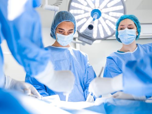 image of surgeons performing surgery