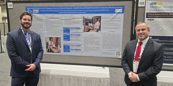 Jeff Hardwick, PharmD (left) and Jacob Wetsell, PharmD, BCPS (right) at the poster presentation during the American Society of Health-System Pharmacists (ASHP) Midyear 2024 Clinical Meeting & Exhibition in New Orleans, Louisiana. Jeff Hardwick, PharmD (left) and Jacob Wetsell, PharmD, BCPS (right) at the poster presentation during the American Society of Health-System Pharmacists (ASHP) Midyear 2024 Clinical Meeting & Exhibition in New Orleans, Louisiana.