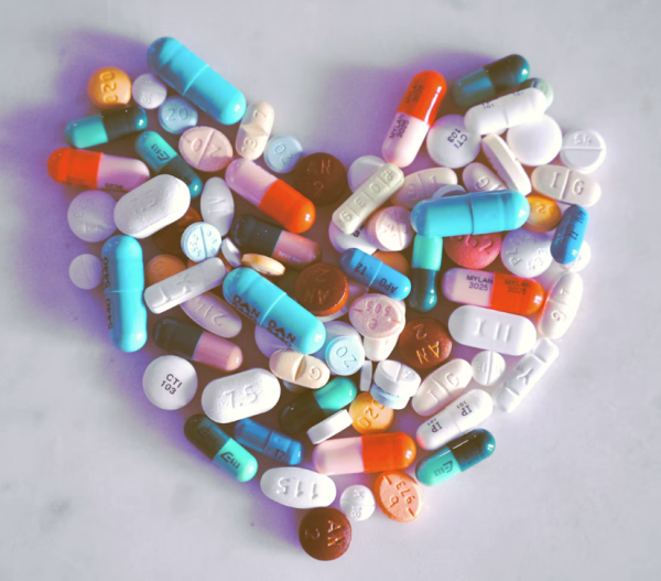 A compiled bunch of pills shaped into a heart, because art.