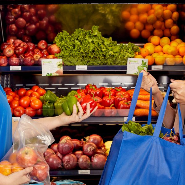 helping a visitor to the food pharmacy