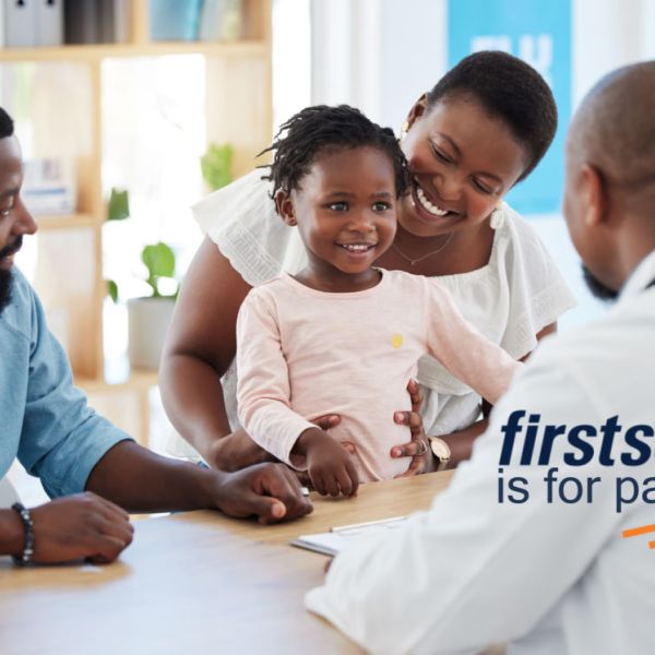 firstsource logo, family talking to physician