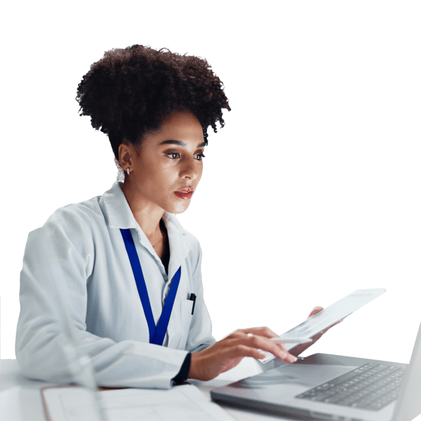 a woman researching at a laptop