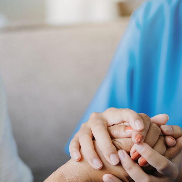 stock photo nurse consoling patient