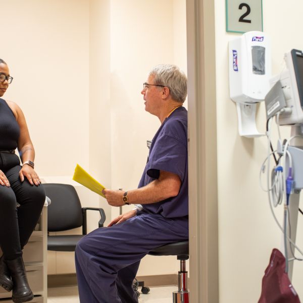 woman in exam room at NGH